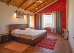 Cama o camas de una habitación en Nilaya - The Himalayan cottage