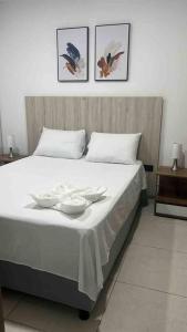 Ένα ή περισσότερα κρεβάτια σε δωμάτιο στο Apartamento lujoso en Valledupar