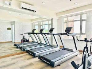 Het fitnesscentrum en/of fitnessfaciliteiten van Nordic 1BR in Twin Lakes Tagaytay LL3-G
