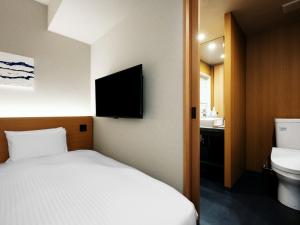 Voodi või voodid majutusasutuse MIMARU Tokyo Station East toas