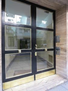 a glass door on a building with at Recoleta Apartamento in Buenos Aires