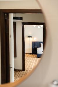 Postel nebo postele na pokoji v ubytování Žilvinas Hotel