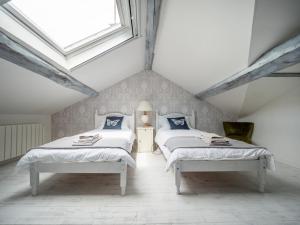Ένα ή περισσότερα κρεβάτια σε δωμάτιο στο Villa Duroux +23 φωτογραφίες
