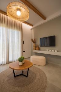 TV a/nebo společenská místnost v ubytování Palaia Luxury Suite