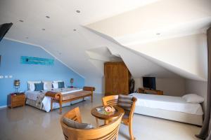 Postel nebo postele na pokoji v ubytování Crown Beach Hotel Seychelles + 37 fotografií