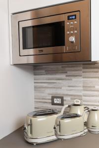 Dapur atau dapur kecil di Gomes Comfort House 2