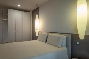 Katil atau katil-katil dalam bilik di Gomes Comfort House 2