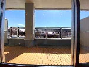 a view from the balcony of a building at Hotel Lavenir in Biei