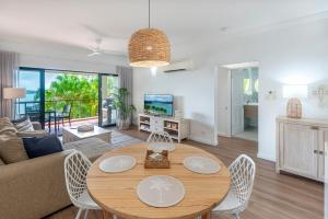 A seating area at Haven on Hamilton Island -private apartment with views & buggy Fully Renovated in 2023