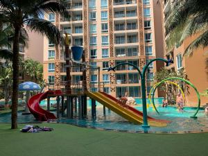 a playground in a hotel with children playing in the water at Atlantis Condominium Resort Pattaya in Jomtien Beach