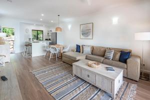 A seating area at Haven on Hamilton Island -private apartment with views & buggy Fully Renovated in 2023