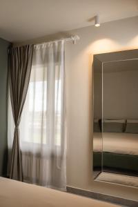 Katil atau katil-katil dalam bilik di Gomes Comfort House 2