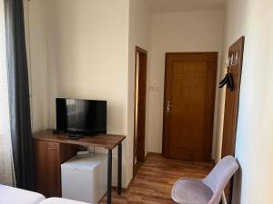 TV a/nebo společenská místnost v ubytování Penzion Znojmo