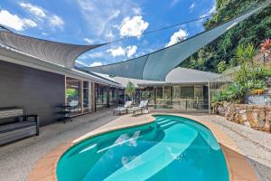 Πισίνα στο ή κοντά στο Idyllic Whitsunday Holiday Home with amazing views