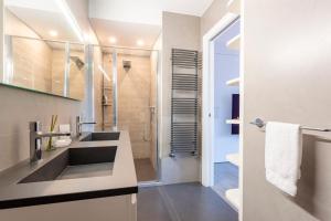 a bathroom with a sink and a shower at Sea View Terrace In Santa Margherita - Happy Rentals in Santa Margherita Ligure +26 photos