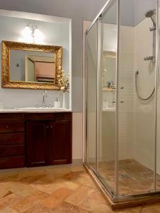 a bathroom with a shower and a sink at Palazzo Lauri Spoleto in Spoleto +56 photos