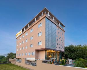 a hotel building with a climbing wall at Zone Connect by The Park,Udaipur in Udaipur