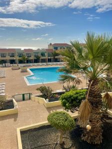 a view of a swimming pool in a resort at Casa Las Torres 209 in Costa de Antigua