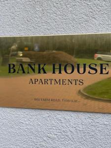 a sign for a bank house apartments on a wall at Yarm Luxury Apartments - Bank House - private gated carpark in Yarm
