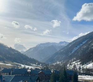 a view of a valley with mountains in the background at Studio Pablotin d’Abriès in Abriès