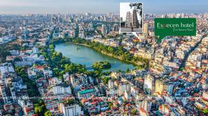 Luftblick auf eine Stadt mit Fluss in der Unterkunft Especen Hotel in Hanoi