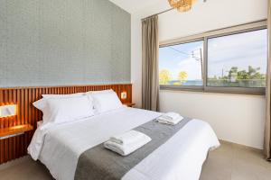 Postel nebo postele na pokoji v ubytování Villa Pacy + 26 fotografií