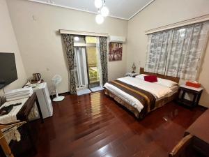 Giường trong phòng chung tại Yun Siang Ju Homestay