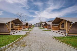 a row of tents in a row at Glamping Tents in Tuhelj with thermal riviera tickets in Tuheljske Toplice