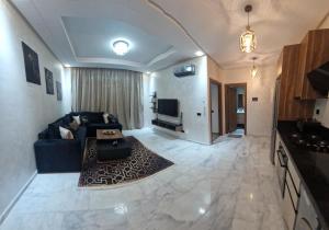 Millénium vip parc appartement的休息区
