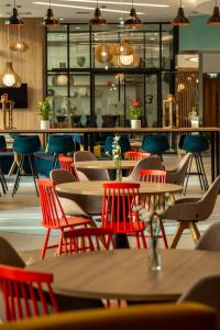Reštaurácia alebo iné gastronomické zariadenie v ubytovaní Hampton By Hilton Poznan Swarzedz