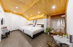 Postel nebo postele na pokoji v ubytování Olagi Hotel 2