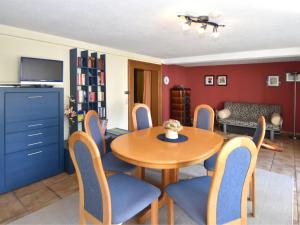 a dining room with a table and chairs at Comfortable holiday home in the Weser Uplands with saunas and solarium in Schieder-Schwalenberg