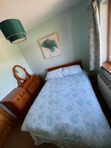 Postel nebo postele na pokoji v ubytování Runclevin House