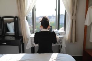 Postel nebo postele na pokoji v ubytování Olagi Hotel 2