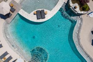 an overhead view of a swimming pool with a resort at Chalet "Villa Marlene" in Zell am See