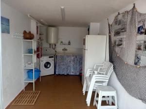 Kuchyň nebo kuchyňský kout v ubytování Gran Terraza cerca del mar.