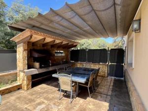 Αίθριο ή υπαίθριος χώρος στο Casa Judibar con zona de barbacoa y piscina