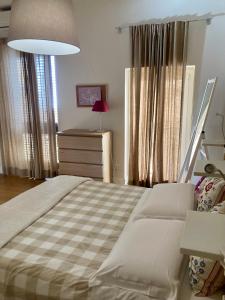 Agrigento Flat - apartment with Private Parkingにあるベッド