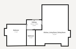 um diagrama de bloco de uma casa em Fitzrovia Apartment By Morethanstays em Londres