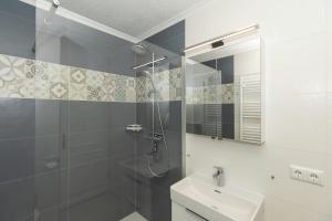 Koupelna v ubytování Haus Atlantik + 19 fotografií