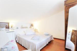 Postel nebo postele na pokoji v ubytování I Sicomori - Seme di Carota - Glamping e appartamenti con piscina a Saturnia