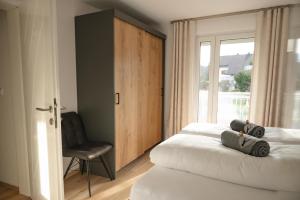 Postel nebo postele na pokoji v ubytování Ferienwohnung Schönblick