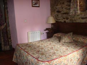 Postel nebo postele na pokoji v ubytování Casa Rural La Ortiga