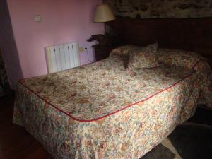 Postel nebo postele na pokoji v ubytování Casa Rural La Ortiga