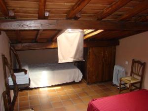 Postel nebo postele na pokoji v ubytování Casa Rural La Ortiga