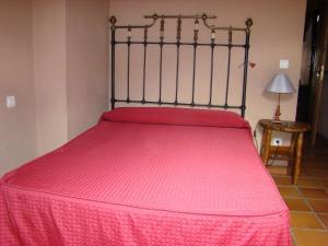 Postel nebo postele na pokoji v ubytování Casa Rural La Ortiga