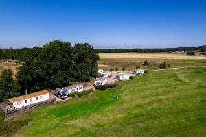 an aerial view of a group of campgrounds in a field at Halmstad Tönnersjö Golf in Eldsberga