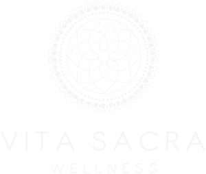 a white circle with a mandala on it at Vita Sacra Wellness in Thessaloniki
