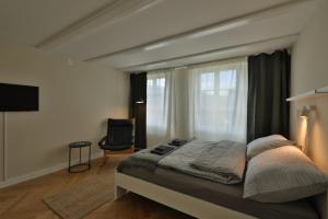 Postel nebo postele na pokoji v ubytování Union Apartments Bern-Belp