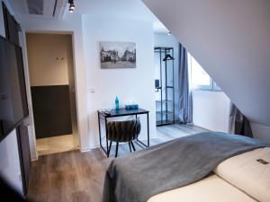Postel nebo postele na pokoji v ubytování Hotel KUMP365